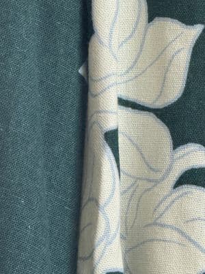 a close up of a fabric with a flower pattern
