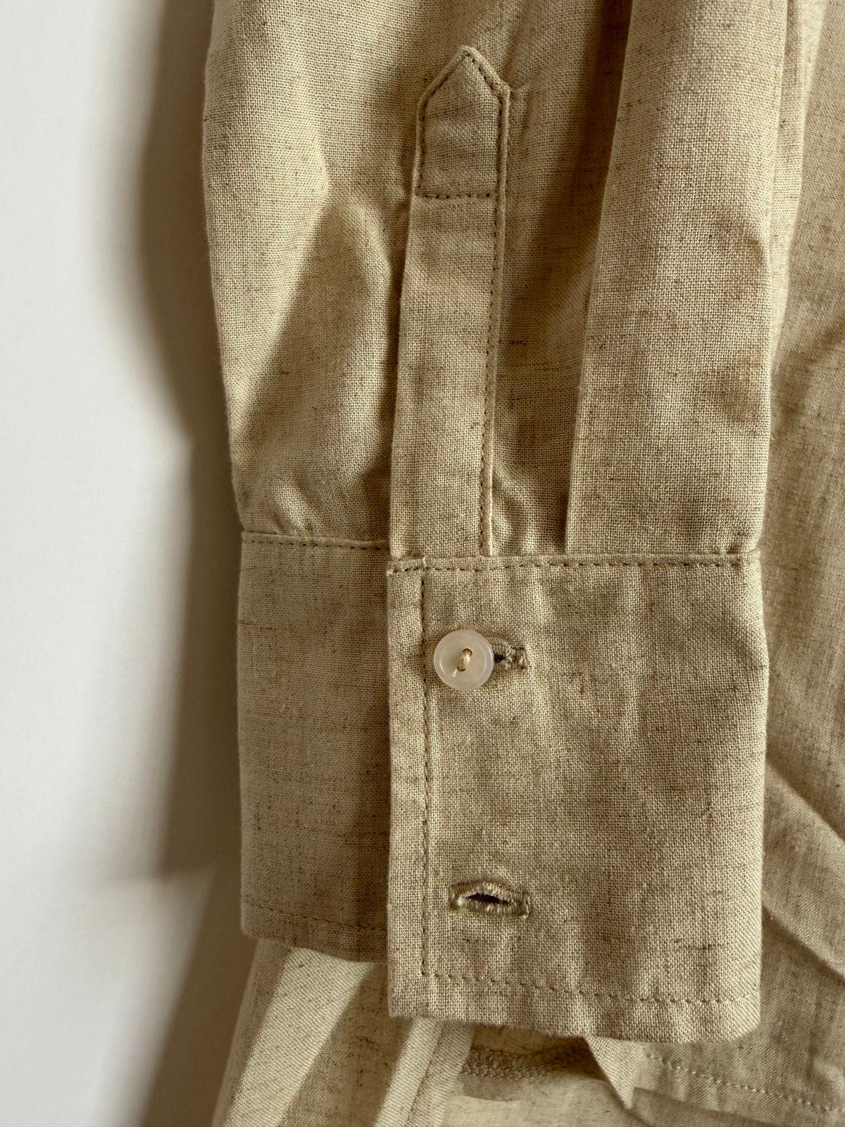 a close up of a shirt on a hanger