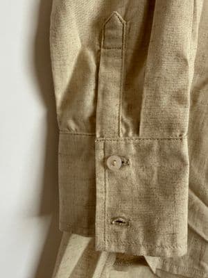 a close up of a shirt on a hanger