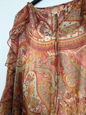 a close up of a dress on a hanger