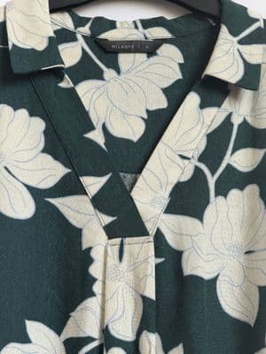 a close up of a shirt on a hanger