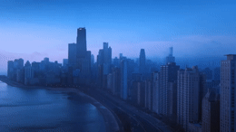 a view of a large city with tall buildings