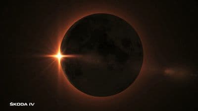a solar eclipse is seen in the dark sky