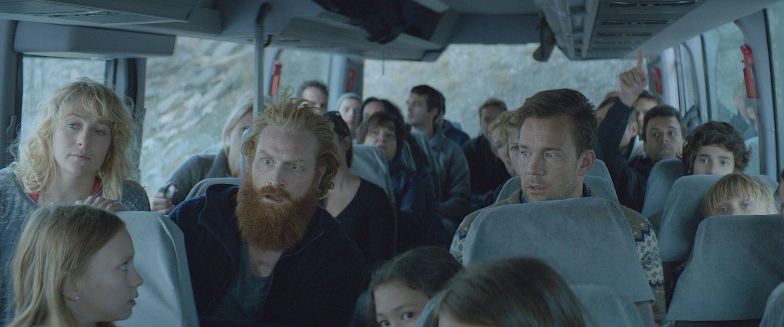 a group of people riding on a bus