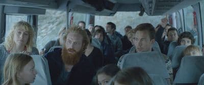 a group of people riding on a bus