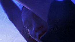 a close up of a person holding a cell phone