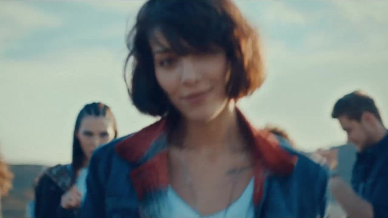 a group of people standing next to each other