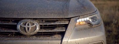 a close up of the front grille of a car
