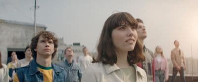 a group of people standing next to each other