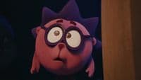 a close up of a cartoon character with big eyes