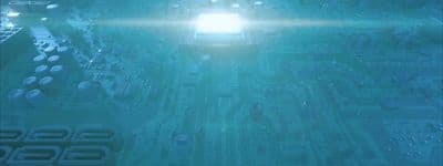 a computer circuit board with a bright light coming out of it