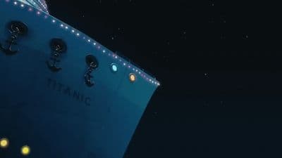 a large blue boat with lights on it's side
