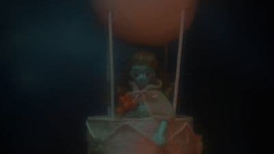 a creepy clown in a hot air balloon
