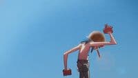 a man with a hat and gloves is flying a kite