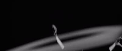 a blurry photo of a black and white object