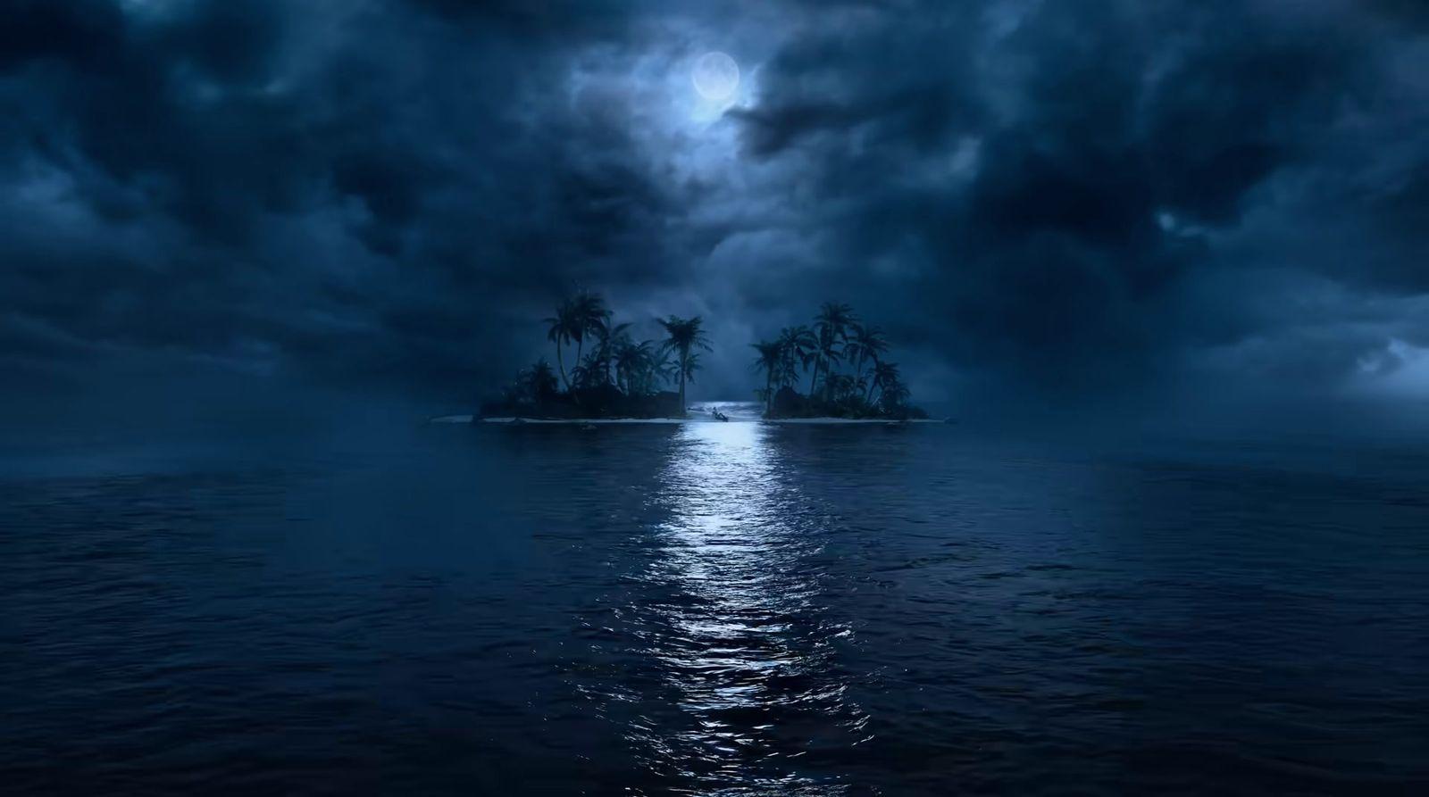 an island in the middle of a body of water under a cloudy sky