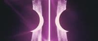 a purple and white picture of a tall tower