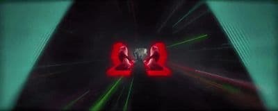 a pair of red high heeled shoes in a tunnel