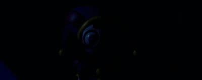 a close up of a cell phone in the dark