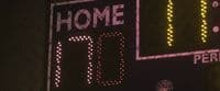 a close up of a score board at a baseball game