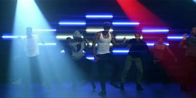 a group of people standing on top of a stage