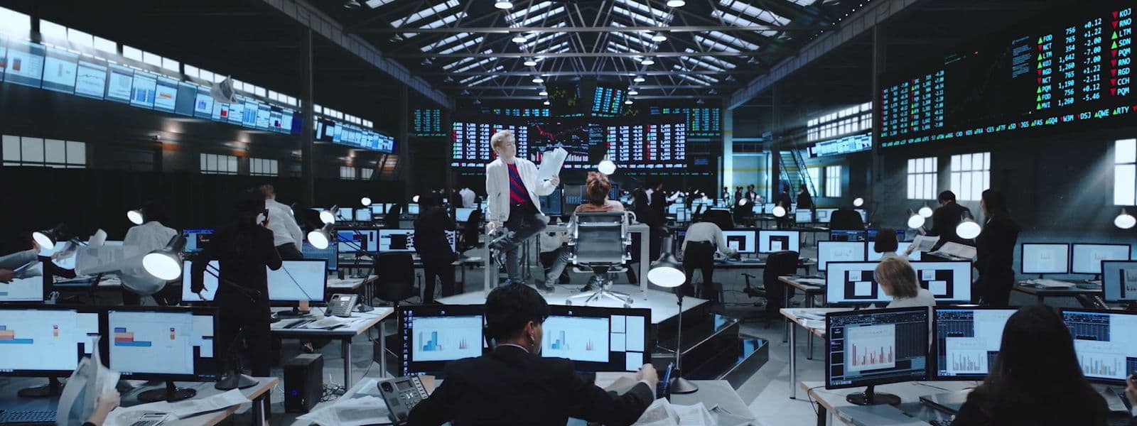a large room filled with lots of computer monitors