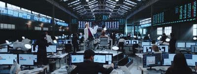 a large room filled with lots of computer monitors