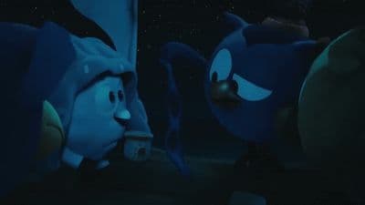a couple of blue birds standing next to each other