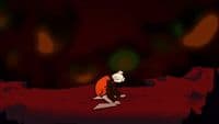 a person kneeling down on a red surface