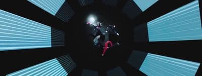 a group of people standing inside of a tunnel