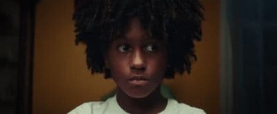 a close up of a person with a shirt on