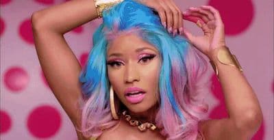 a woman with bright blue and pink hair