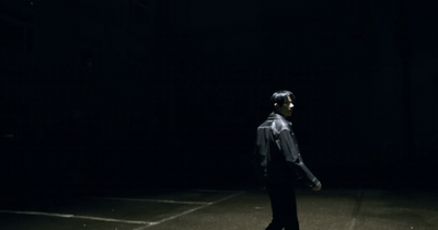 a man walking in the dark alone
