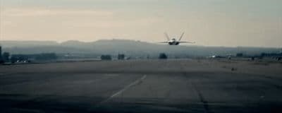 an airplane is taking off from an airport runway