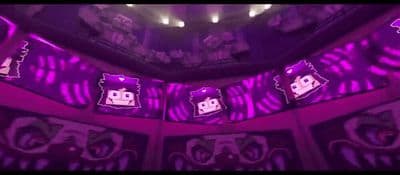 a room filled with lots of purple lights