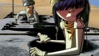 two anime characters sitting on a table in the desert