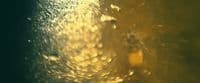 a close up view of a window with rain drops