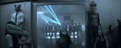a group of people standing in a room