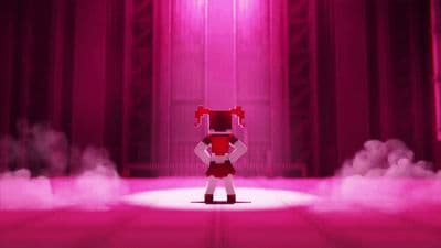 a red and white robot standing on a stage