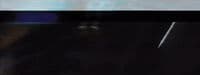 a close up of a television screen with a blurry background