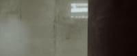 a blurry photo of a toilet in a bathroom