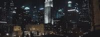 a view of a city at night from a rooftop