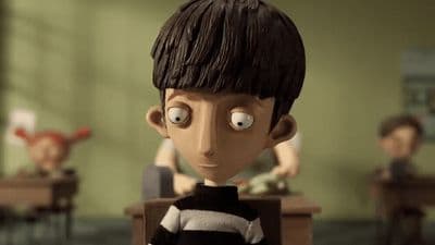 a cartoon of a boy sitting at a desk
