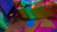 a close up of a multicolored object on a table