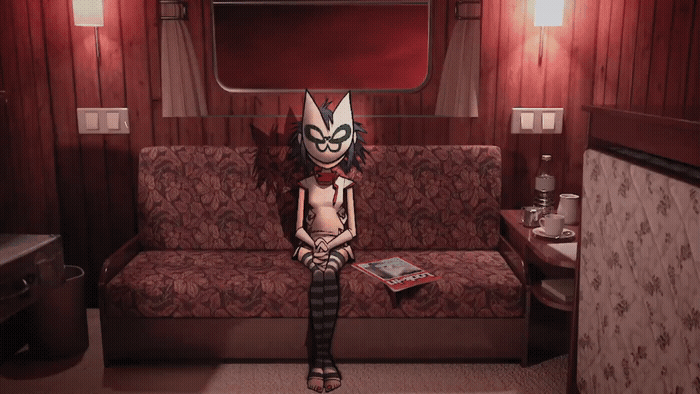 a person sitting on a couch in a room
