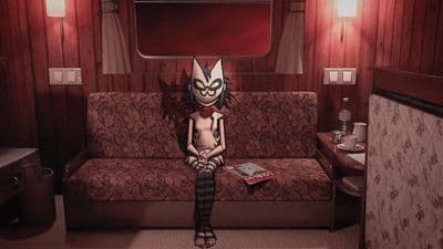 a person sitting on a couch in a room