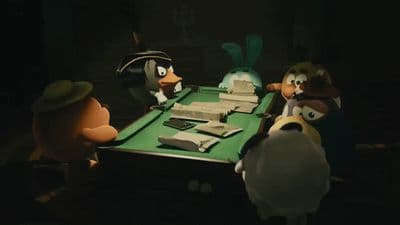 a group of stuffed animals sitting around a table