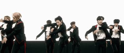 a group of young men standing next to each other