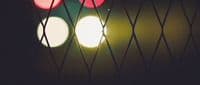 a close up of a traffic light on a pole