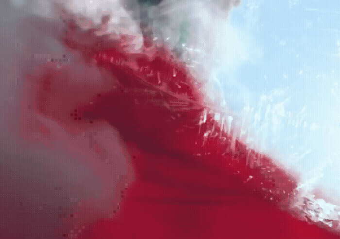 a blurry image of a red and white object